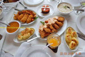 Involtini de Linguado e Namorado Crocante tal qual estão no cardápio.